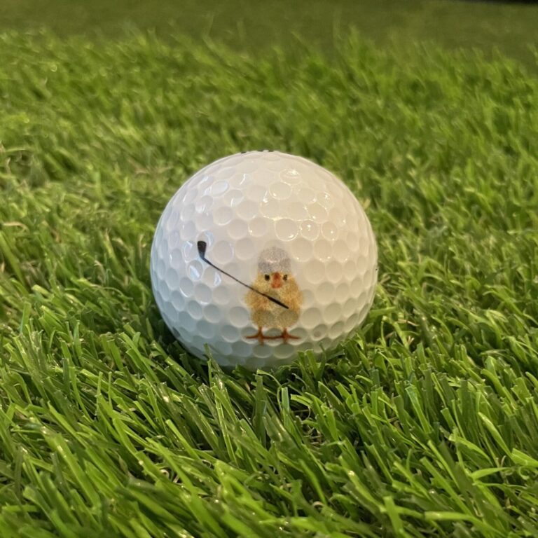 Golf ball (baby chick golfing)
