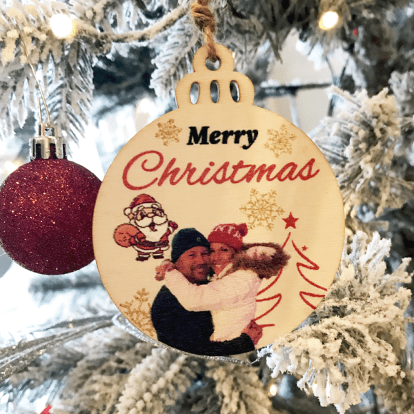 Custom Christmas Wood ornaments featuring branded designs by Disturbed Logo #CustomOrnaments #HolidayPromotions #FestiveBranding #CorporateGiftIdeas #DisturbedLogo